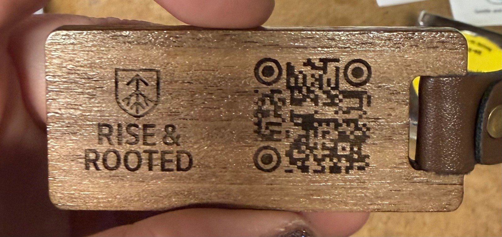 Custom laser-engraved leather keychains and metal business cards